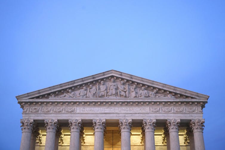 The top of the U.S. Supreme Court building.