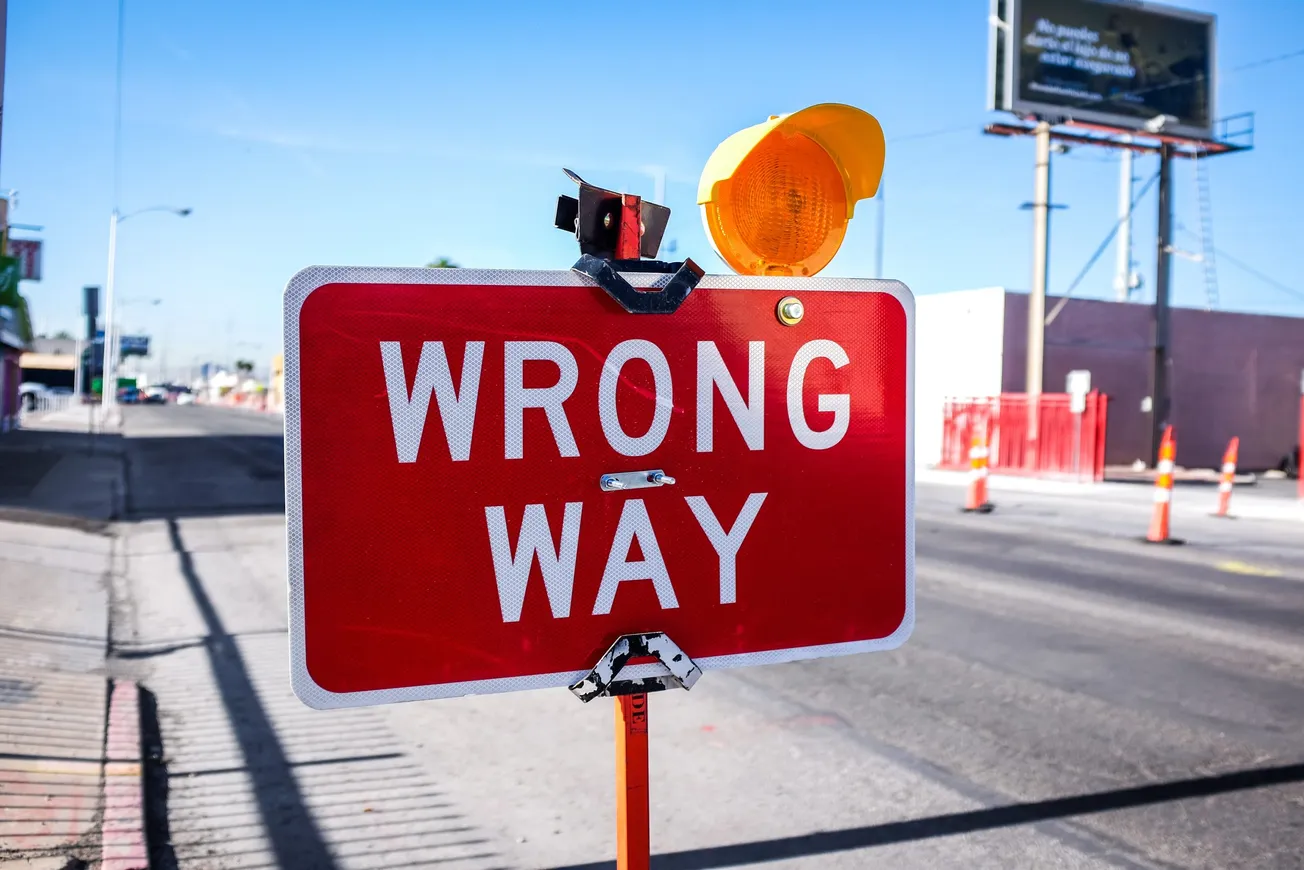 decision-The_BFD-red Wrong Way signage on road