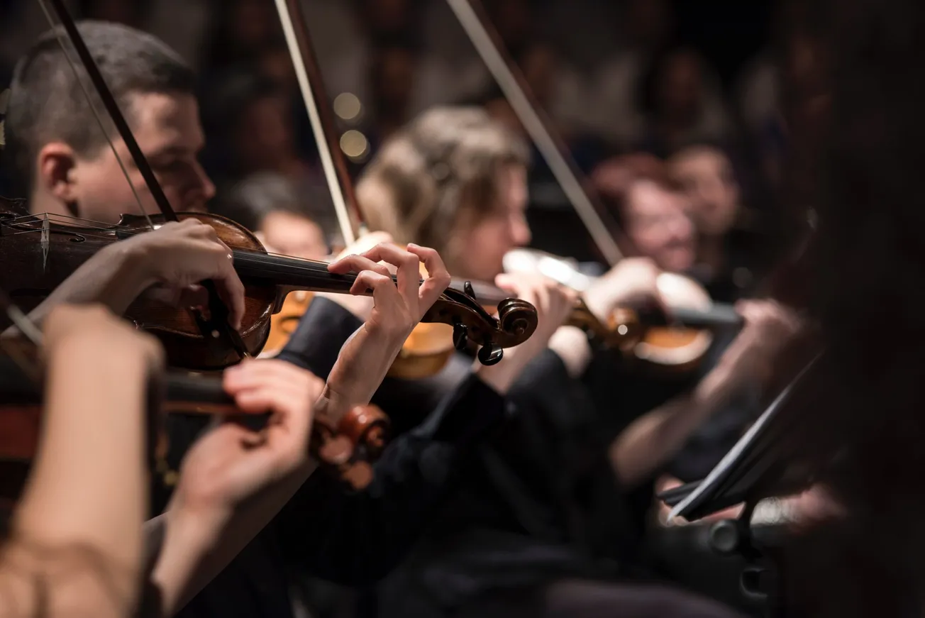 The BFD-people playing violin inside dim room