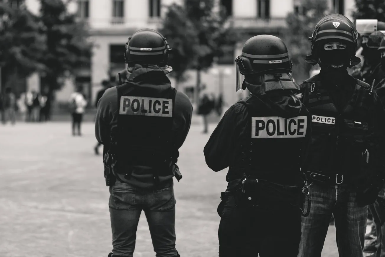 group of police grayscale photo