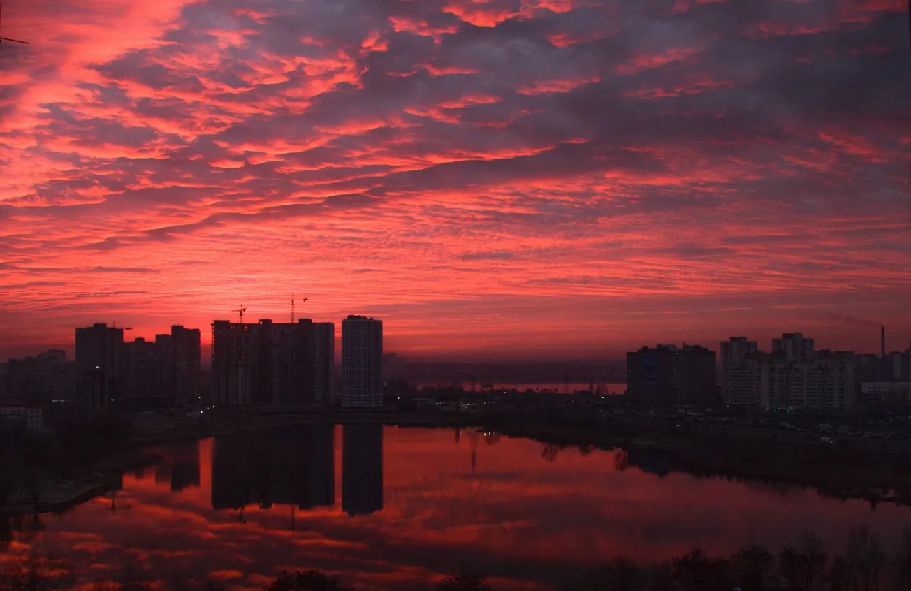 cityscape under red sky