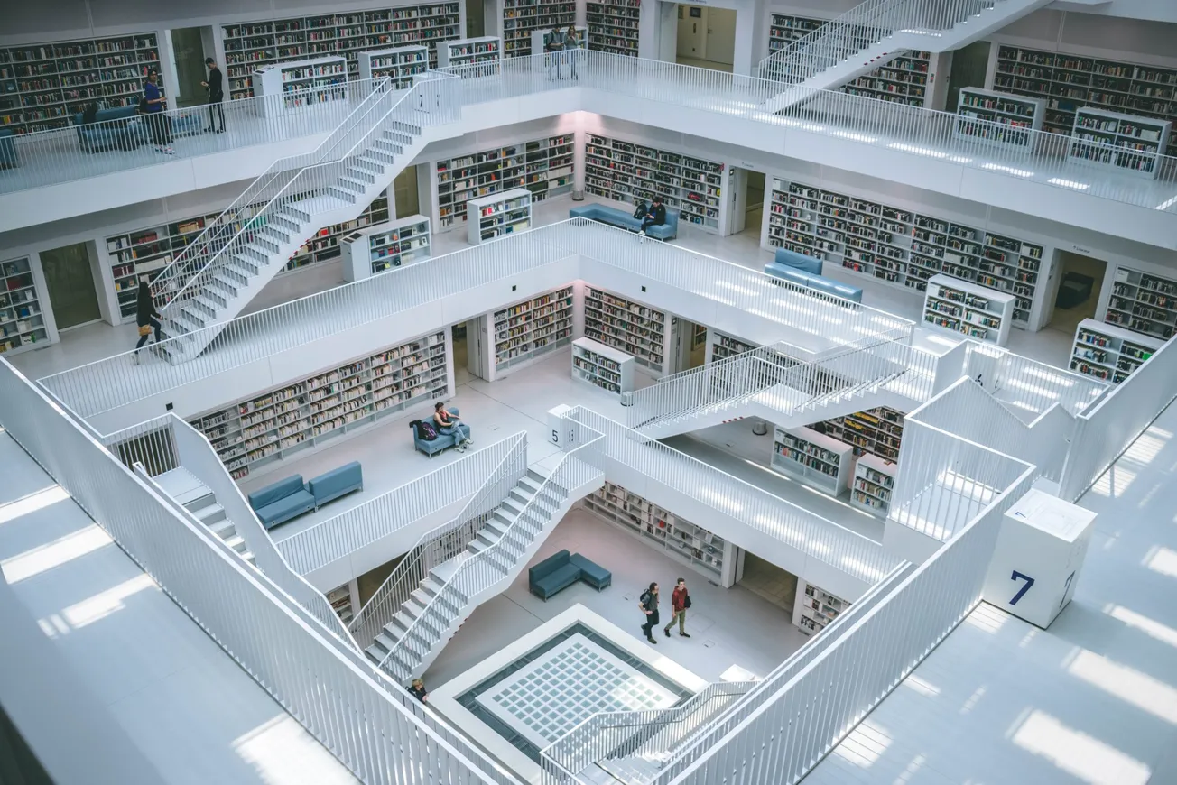 people walking inside library