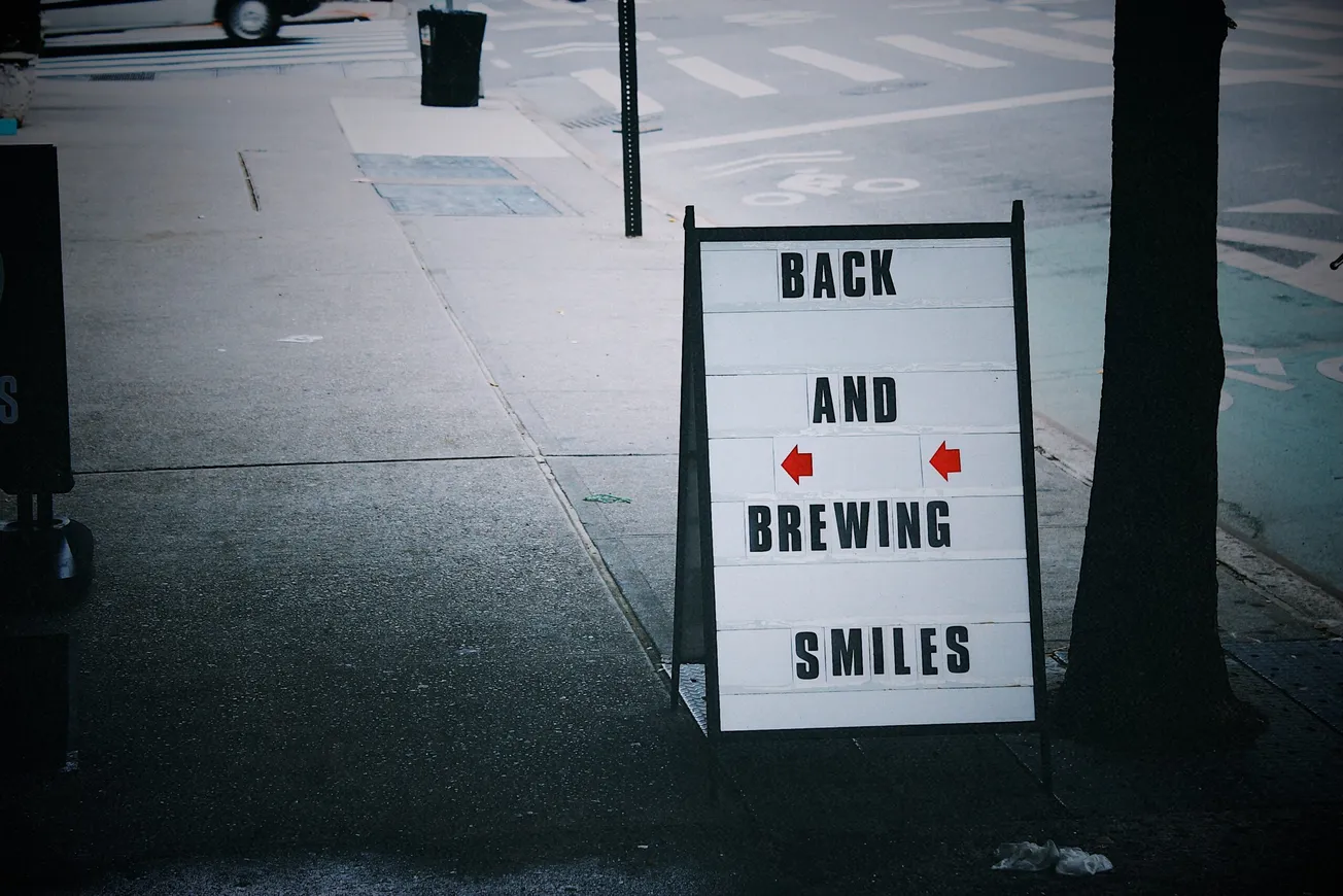 grayscale photo of street sign