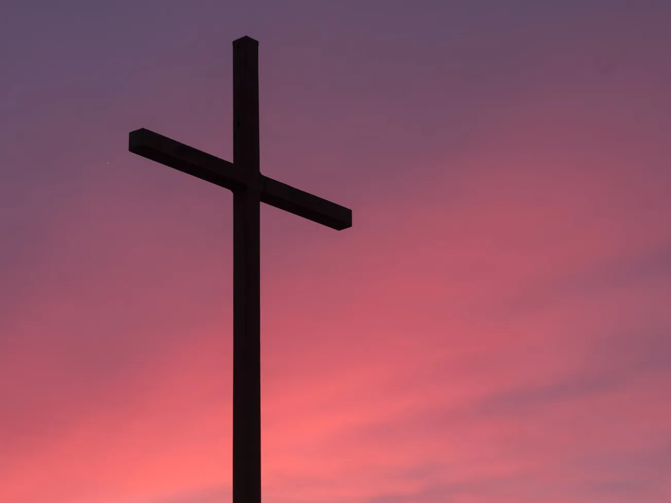 brown wooden cross during golden hour