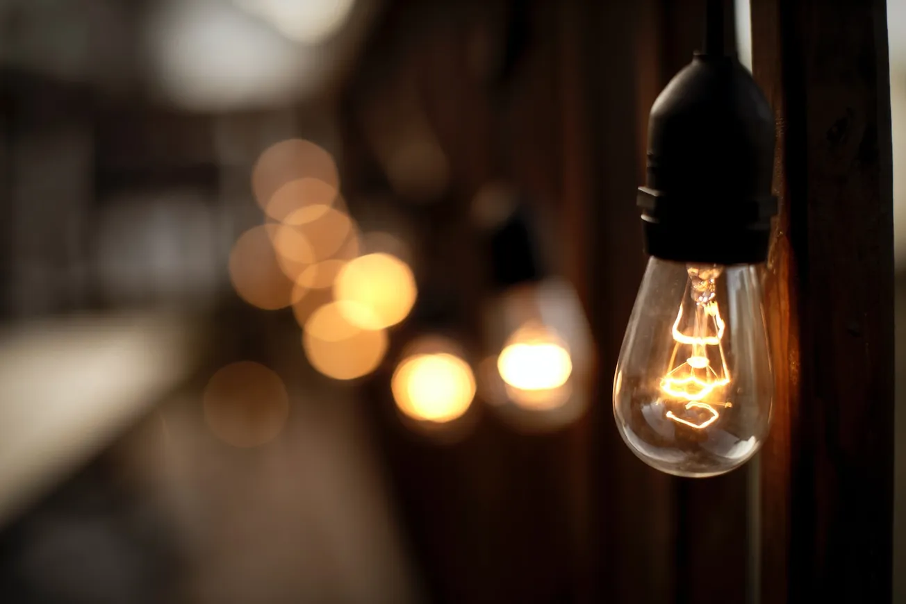 selective focus photography of light bulb