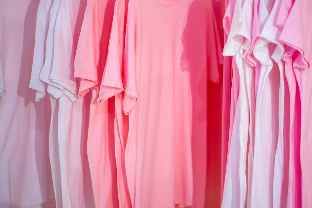 photo of white and pink t-shirts