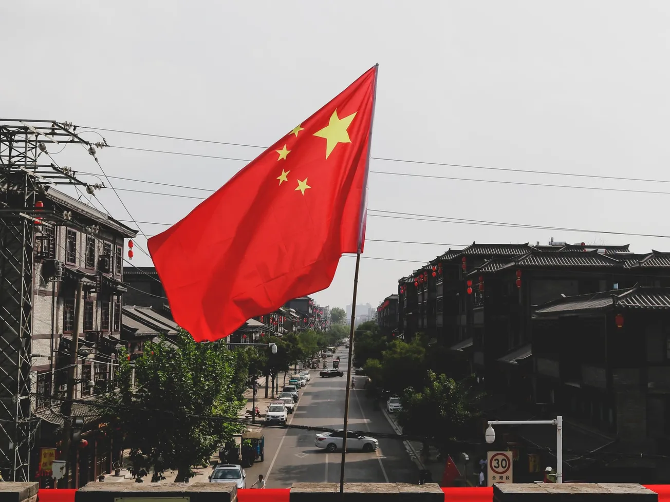 red and white flag on pole