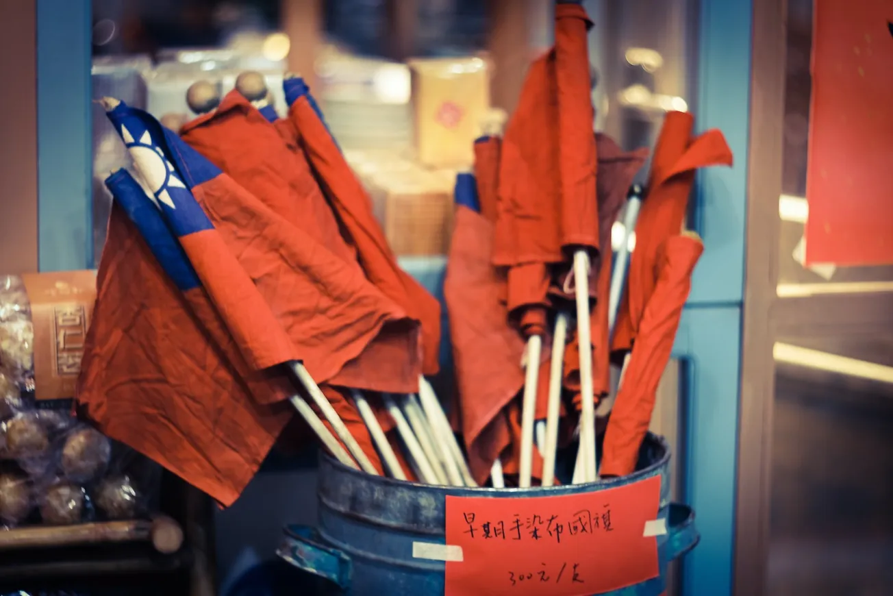 orange textile on blue plastic container