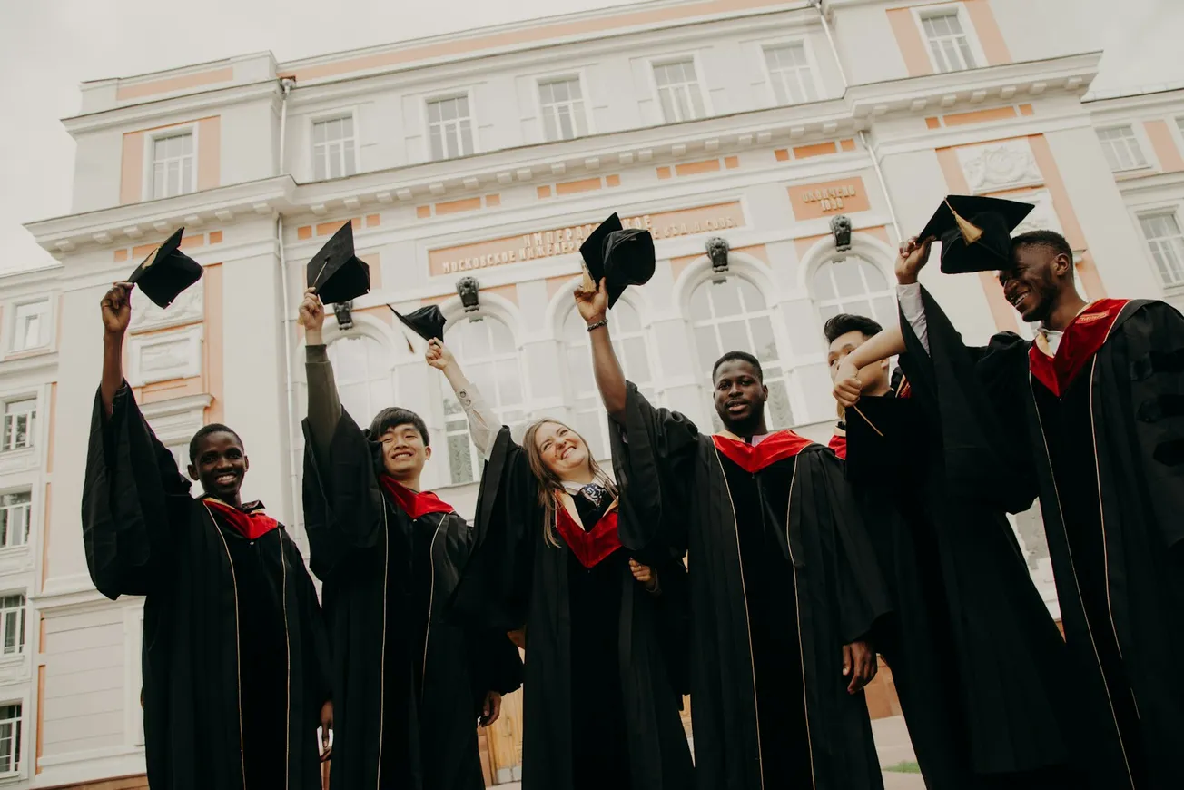 group of people wearing black academic dress