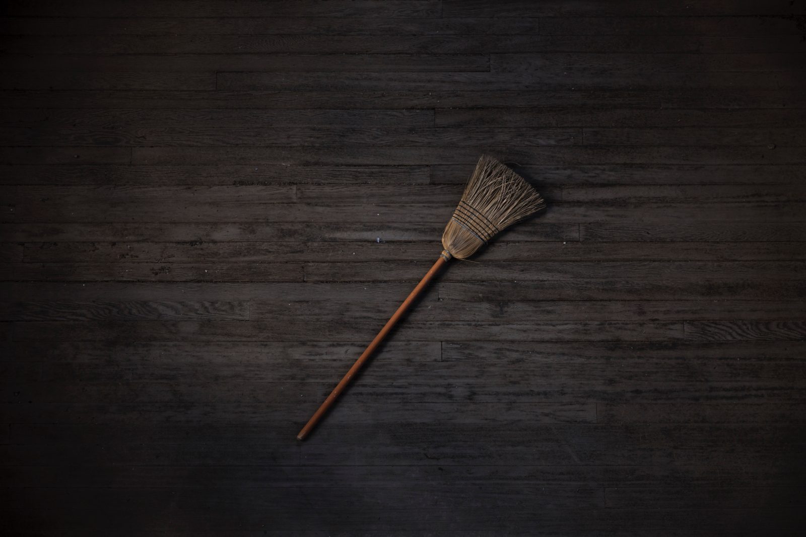 brown and black brush on brown wooden table